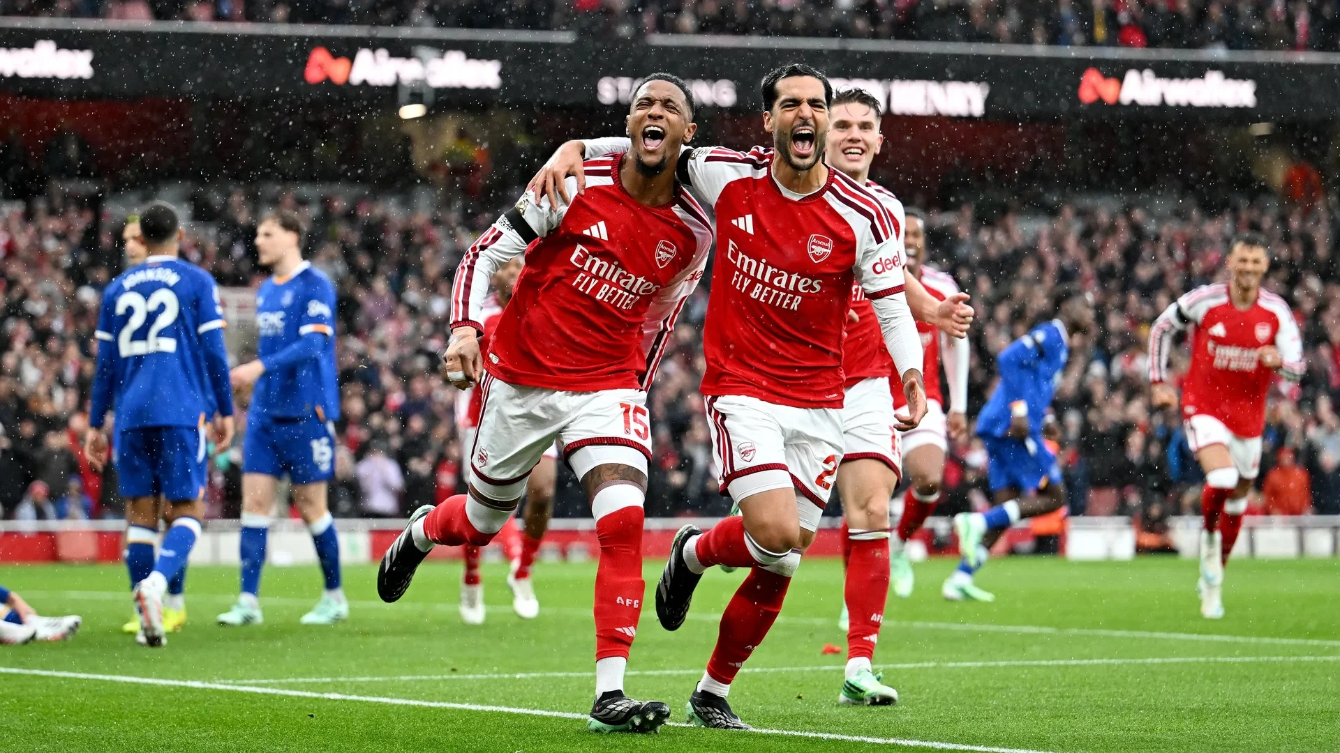 Arsenal defender Ezri Konsa (No 15), in the club's red and white home shirt, celebrates his opening goal against Everton with Arsenal team-mates at a rainy Emirates Stadium on 24 October 2026. Photo: Arsenal FC/Getty Images