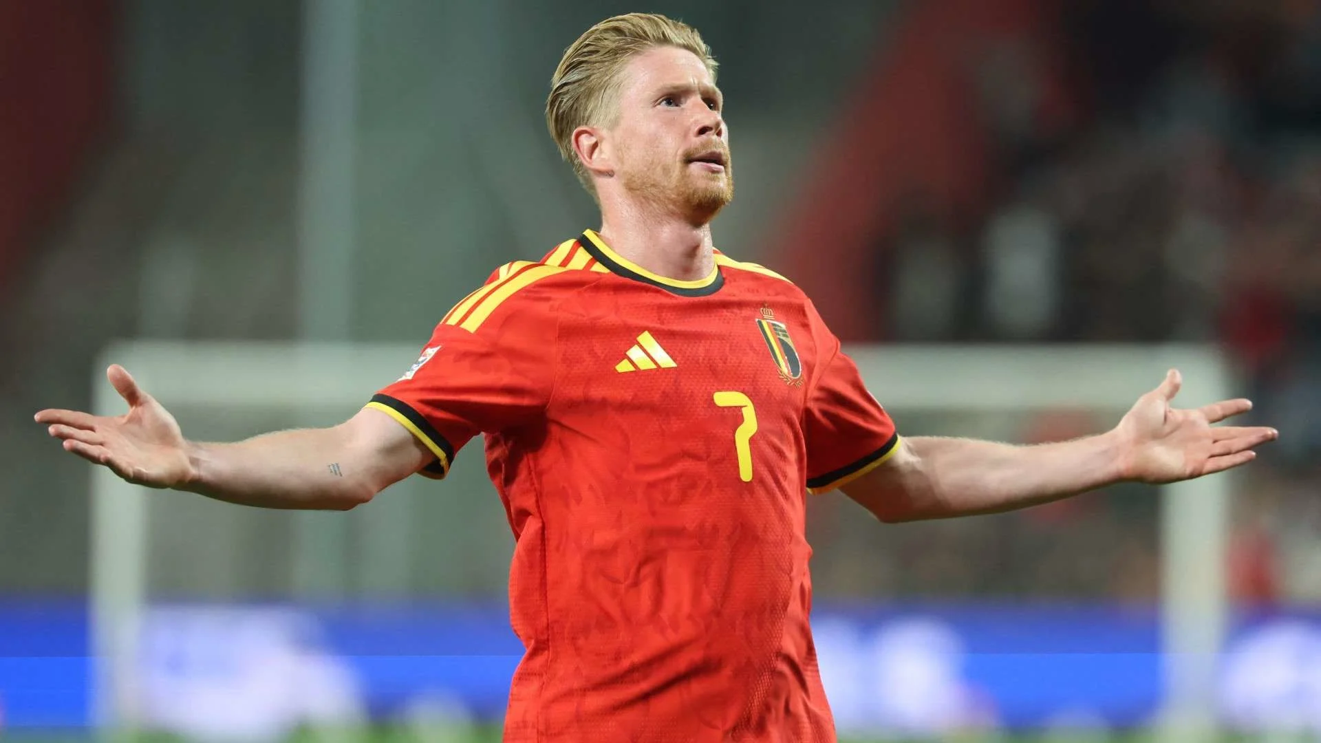 Kevin De Bruyne, in Belgium's red number 7 shirt, celebrates with arms outstretched against Türkiye in Liège (Photo: FotMob / Stats Perform (photographer not named))