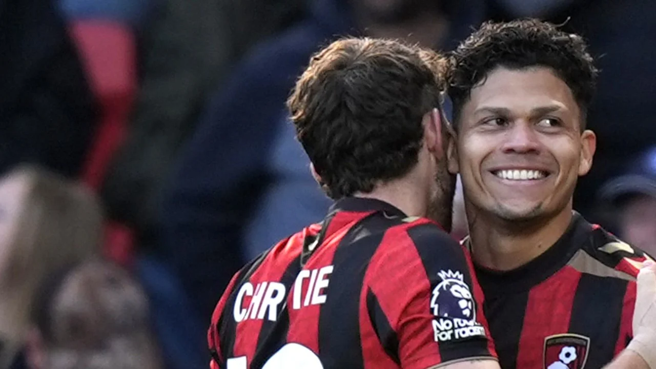 Evanilson, in Bournemouth's red and black striped home kit, smiles as team-mate Ryan Christie (No 10) embraces him after his second-half goal against Sunderland at the Vitality Stadium. Photo: Sky Sports