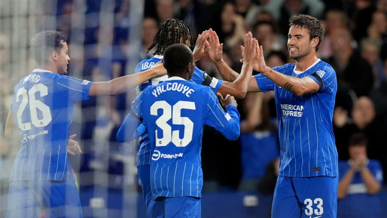 Brighton & Hove Albion players celebrate a goal against Kauno Žalgiris in the UEFA Conference League at the American Express Stadium, with Matt O'Riley among the group. Photo: 101 Great Goals