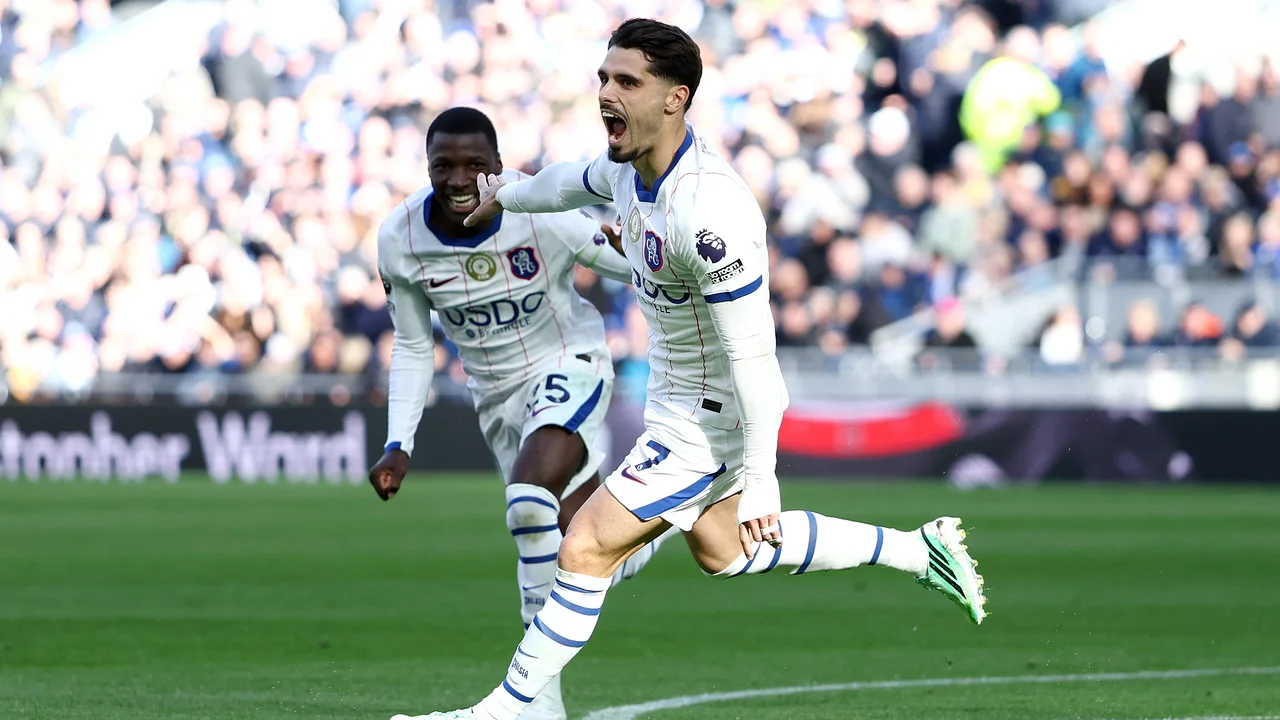 Pedro Neto celebrates in Chelsea's white third kit after scoring against Everton at Hill Dickinson Stadium, with Moisés Caicedo running behind him. Photo: Molly Darlington/Getty Images via The Guardian