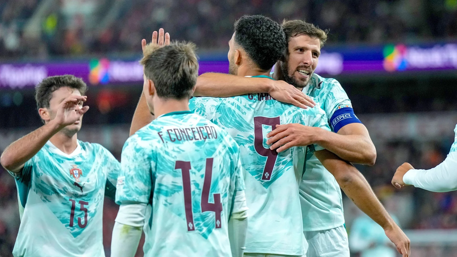 Portugal's Gonçalo Ramos celebrates his second goal with Rúben Dias, Francisco Conceição and João Neves in Portugal's away kit at Ullevaal. Photo: Cornelius Poppe / NTB via Reuters