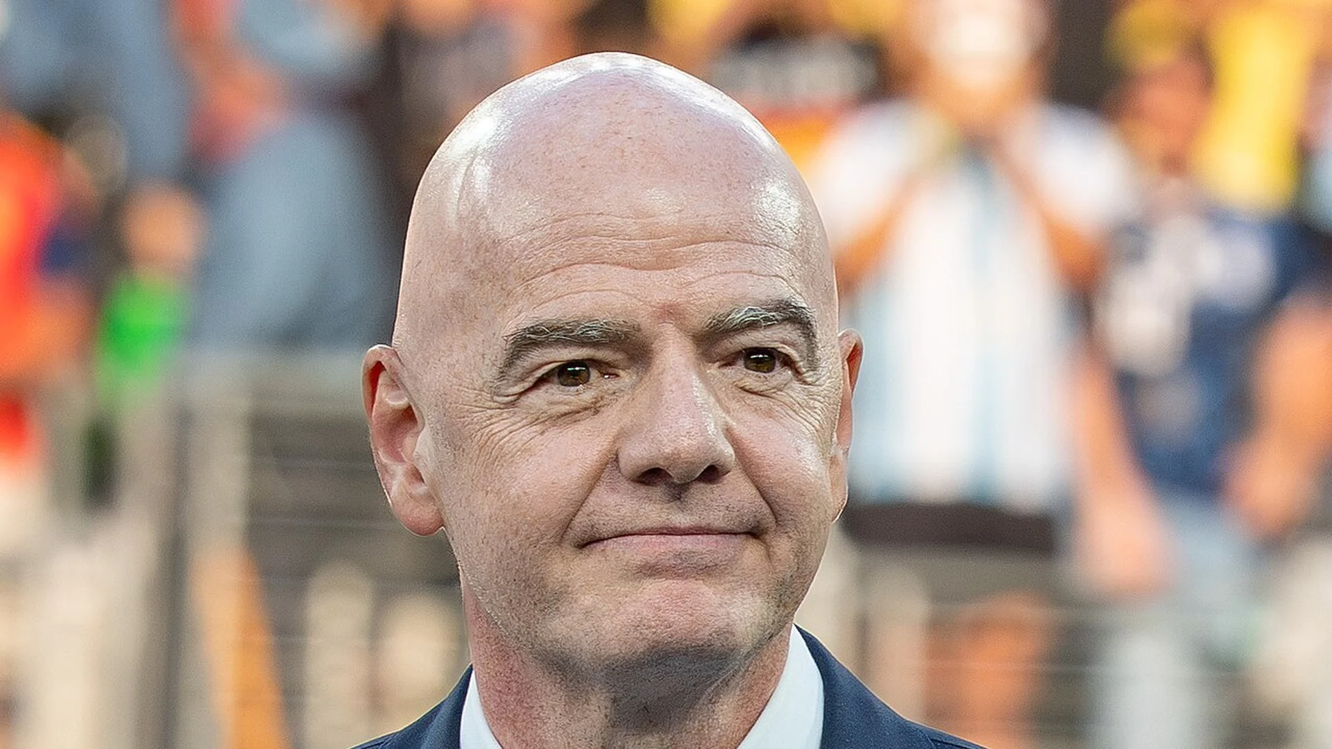 FIFA president Gianni Infantino in a suit at the 2026 FIFA World Cup final between Argentina and Spain.